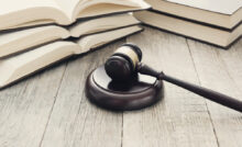 court hammer books judgment law concept