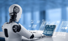 robot humanoid use laptop sit table big data analytic